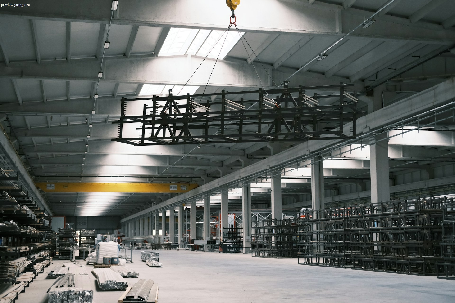 Industrial overhead crane lifting a heavy load